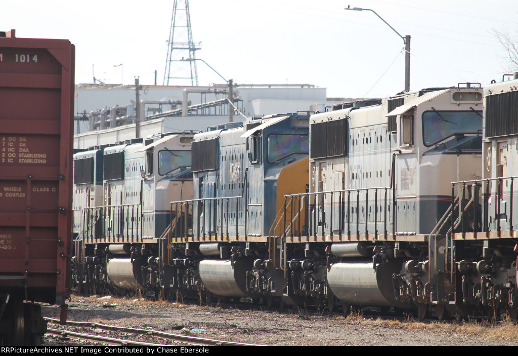 PLRX 9559, CSX 4676, BNSF 9551 